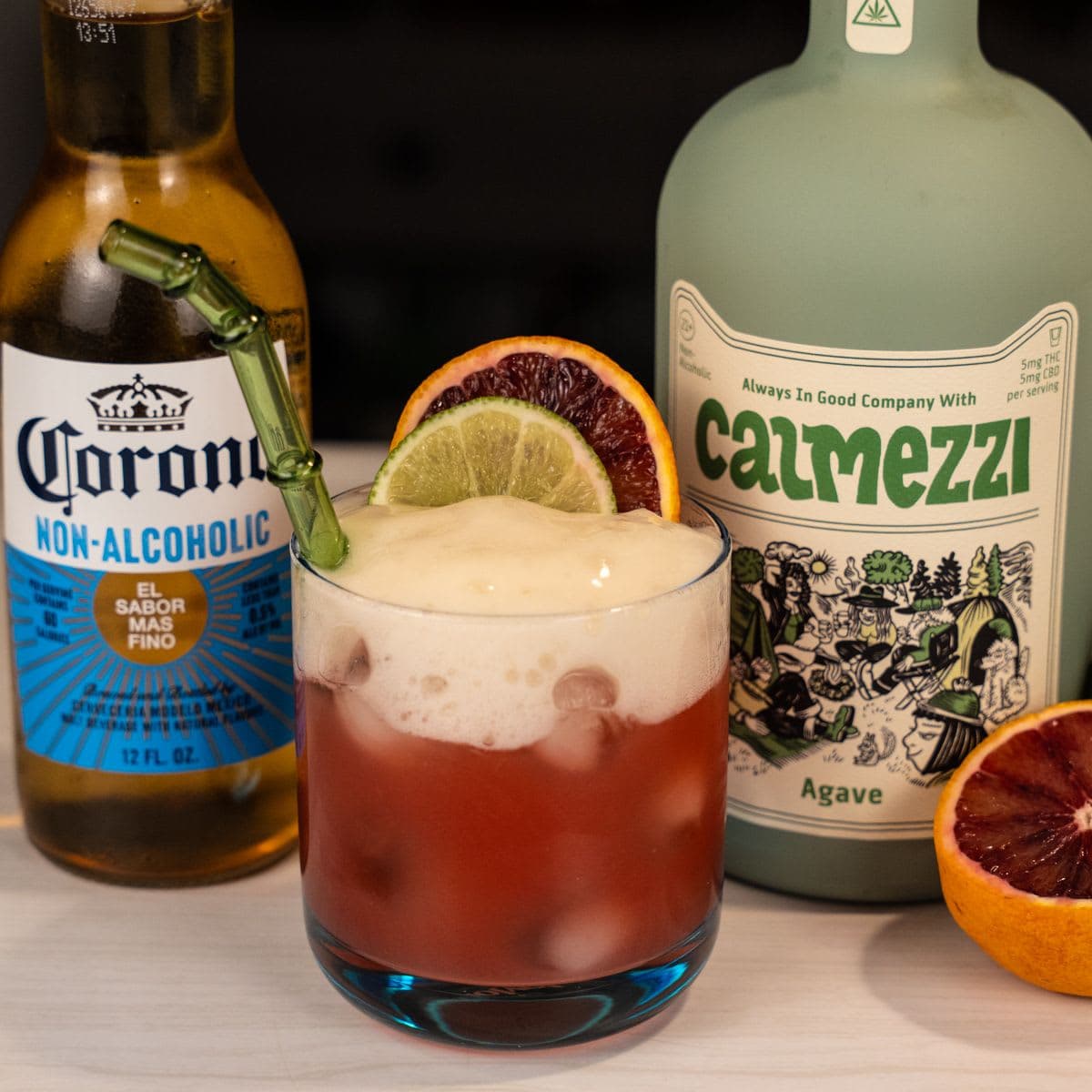THC margarita with blood orange and salted non-alcoholic beer foam, with Calmezzi bottle and non-alcoholic Corona